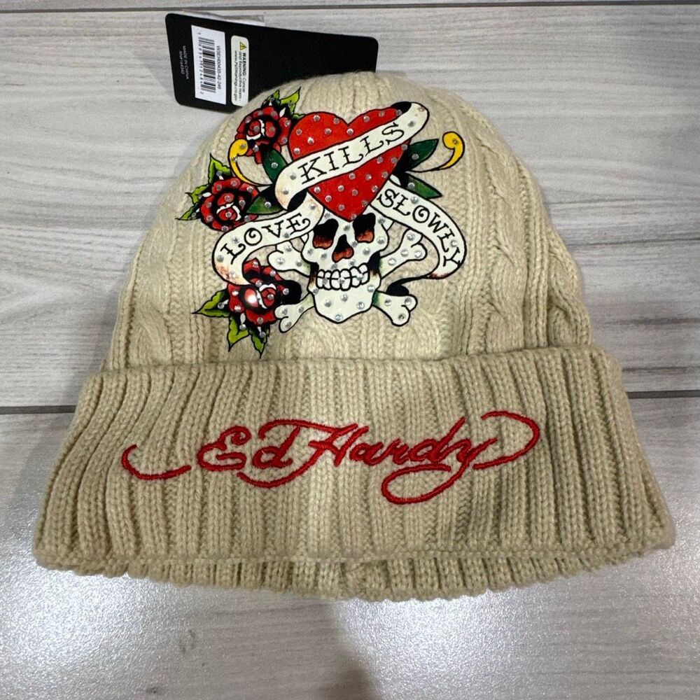 NWT Ed Hardy "Love Kills Slowly" beanie hat in a beige/tan knit material.